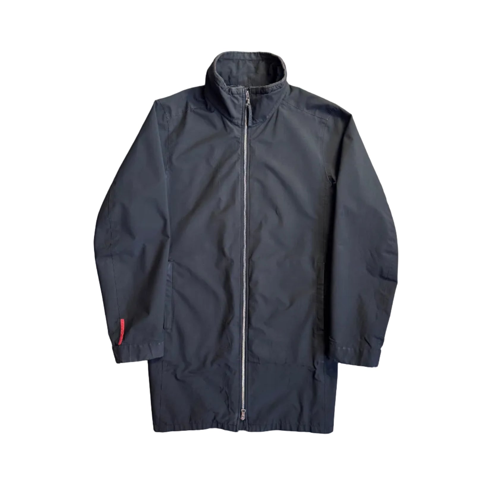 Black jacket with a red zipper pull